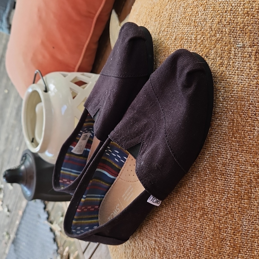 Toms black slip on canvas shoes. Women's size 8